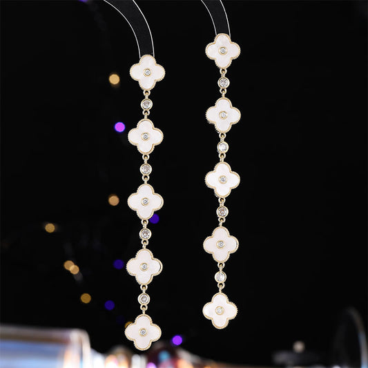 2025 New versatile temperament zircon earrings, high-end earrings wholesale tassel super long face thin lucky grass earrings