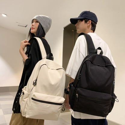 2025 popular lightweight solid color schoolbag female college student travel fashion high school student large capacity backpack middle school student backpack