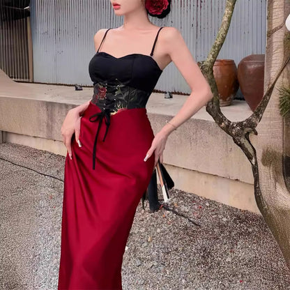 2025 Red and black contrasting colors retro jacquard hip-wrapped long dress women's summer new vacation slim and thin suspender fishtail dress