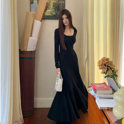 2025 U-neck knitted long-sleeved sweater dress women's autumn high-end sense slim-fitting temperament bottom fishtail skirt long dress