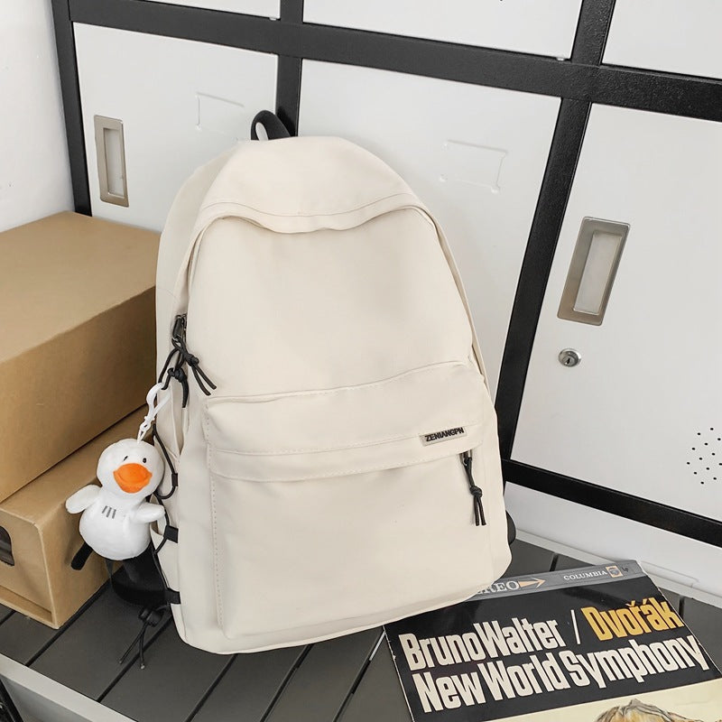 2025 Couple backpack simple large capacity travel backpack female leisure Japanese junior high school student high school student schoolbag male