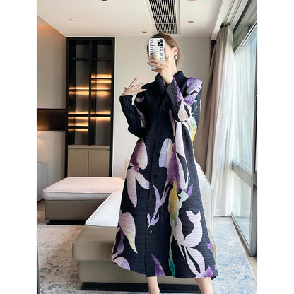 Pleated niche design sense, printing temperament, elegant lapel Miyake dress, loose cover meat and thin big swing skirt women