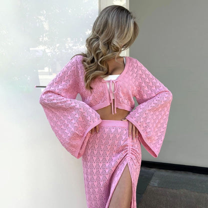 Autumn wear solid color knitted hollow suit women's high sense royal sister horn sleeve top pleated split skirt