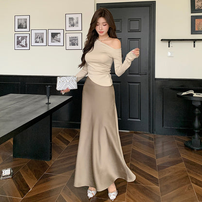 2025 Early autumn pure desire slanted shoulder design pleated waist top women's high sense imitation acetic acid A-shaped skirt skirt set