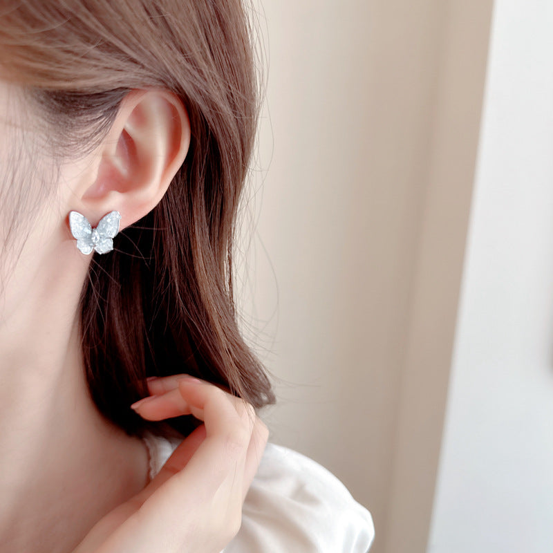 2025 Simple and versatile, high-end sense, super fairy personality, fashion earrings, high-end niche blue crystal butterfly stud earrings, women