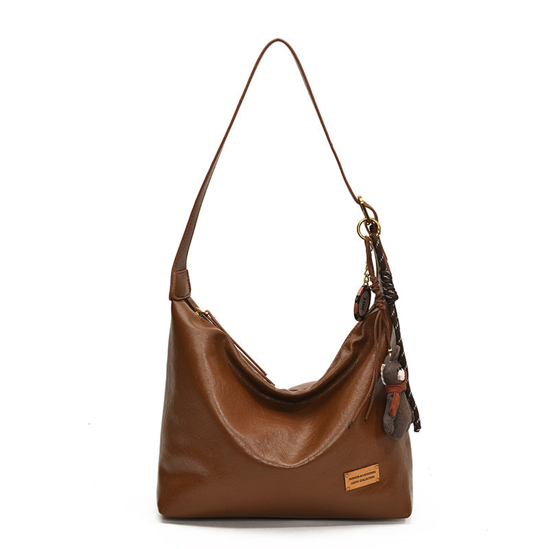 FLOWERSVERSE 2025 Autumn and winter new retro oily leather PU women's bag simple fashion iron brand small square brand armpit bag temperament commuter shoulder bag