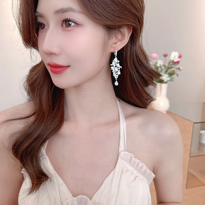 2025 New long fashionable fringed water drop earrings S925 silver needle  heavy industry jewelry earrings simple temperament wholesale