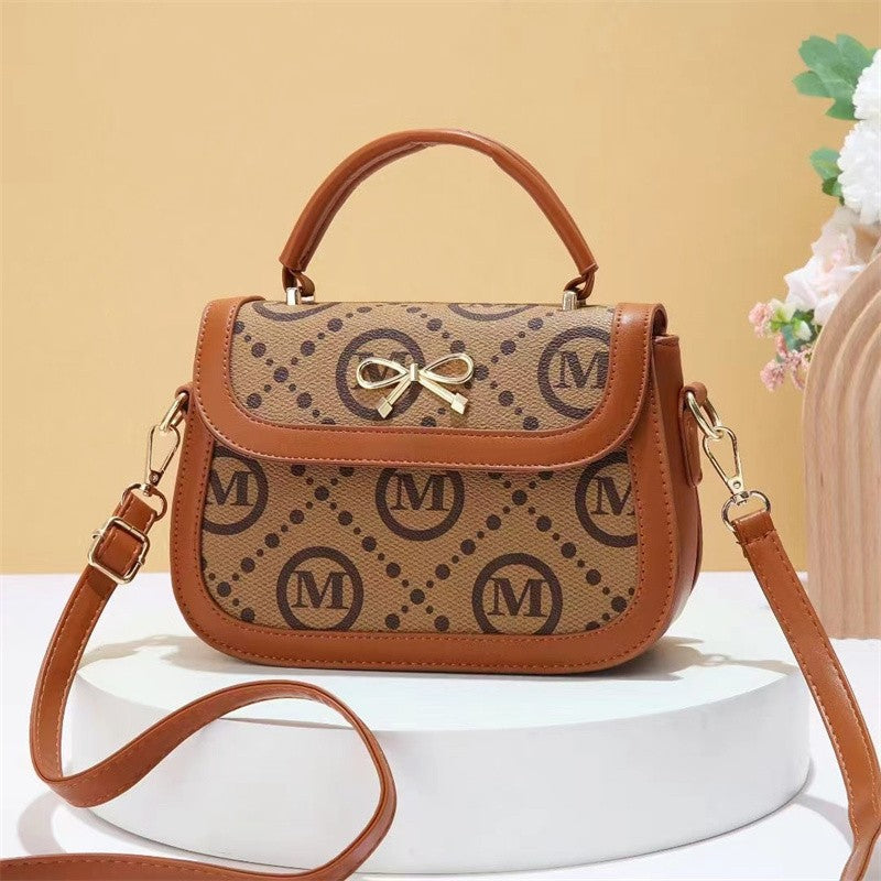 2025 Handbag bag new printed high-end women's handbag light luxury texture saddle bag contrasting color versatile messenger bag
