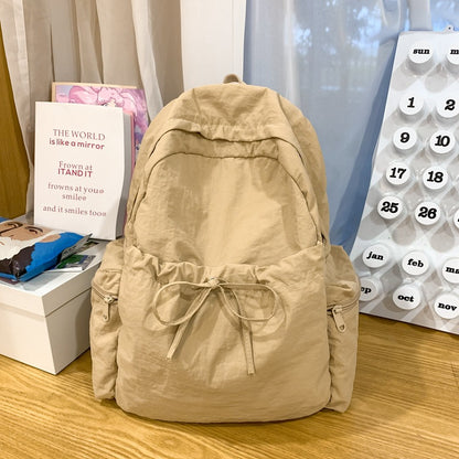 2025 School bag female college student cute bow simple junior high school student backpack female high school student large capacity backpack casual