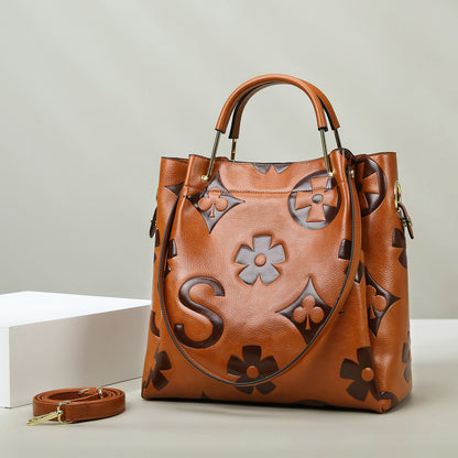 2025 Bucket bags New hot-selling large-capacity handbags, high-end printing contrasting color shoulder bags, commuter bags for women