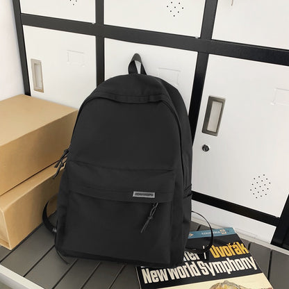 2025 Couple backpack simple large capacity travel backpack female leisure Japanese junior high school student high school student schoolbag male