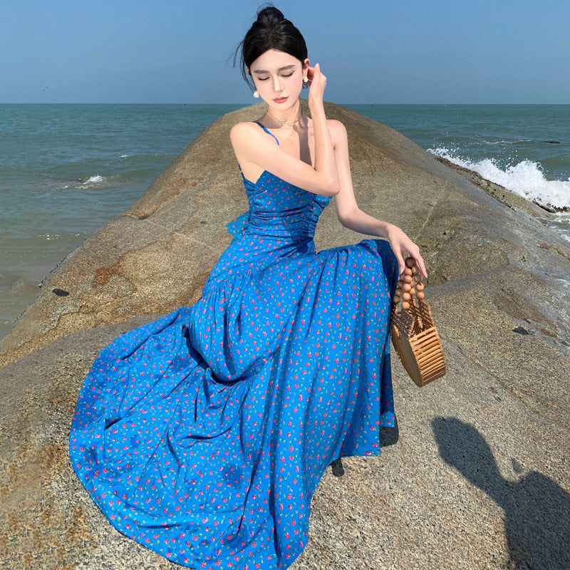 2025 Floral blue suspender dress women's 2025 summer new high-waisted and thin seaside vacation backless spice girl long dress