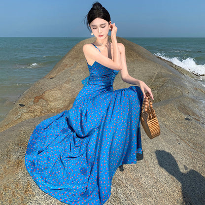 2025 Floral blue suspender dress women's 2025 summer new high-waisted and thin seaside vacation backless spice girl long dress