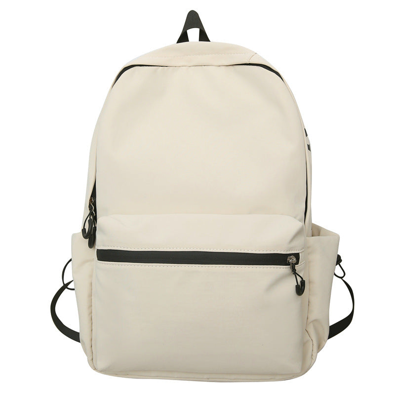 2025 popular lightweight solid color schoolbag female college student travel fashion high school student large capacity backpack middle school student backpack