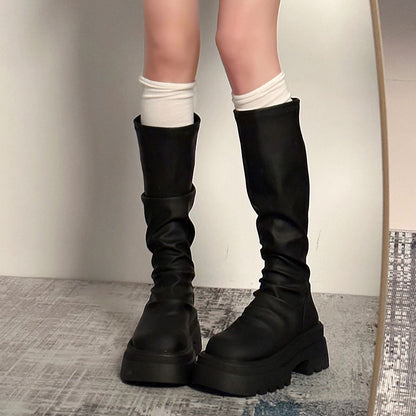2025  Knight boots are popular this year. Tall but knee black thick heel stacked boots, thin boots