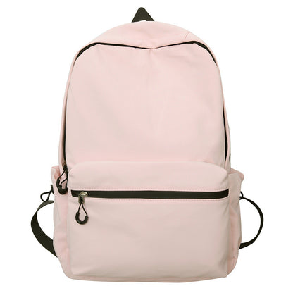 2025 popular lightweight solid color schoolbag female college student travel fashion high school student large capacity backpack middle school student backpack