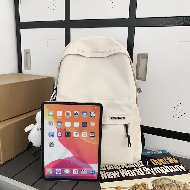 2025 Couple backpack simple large capacity travel backpack female leisure Japanese junior high school student high school student schoolbag male