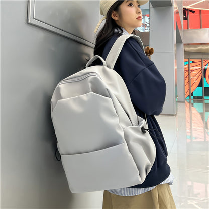 2025 Campus Japanese backpack versatile male and female junior high school college student schoolbag solid color casual large capacity travel backpack