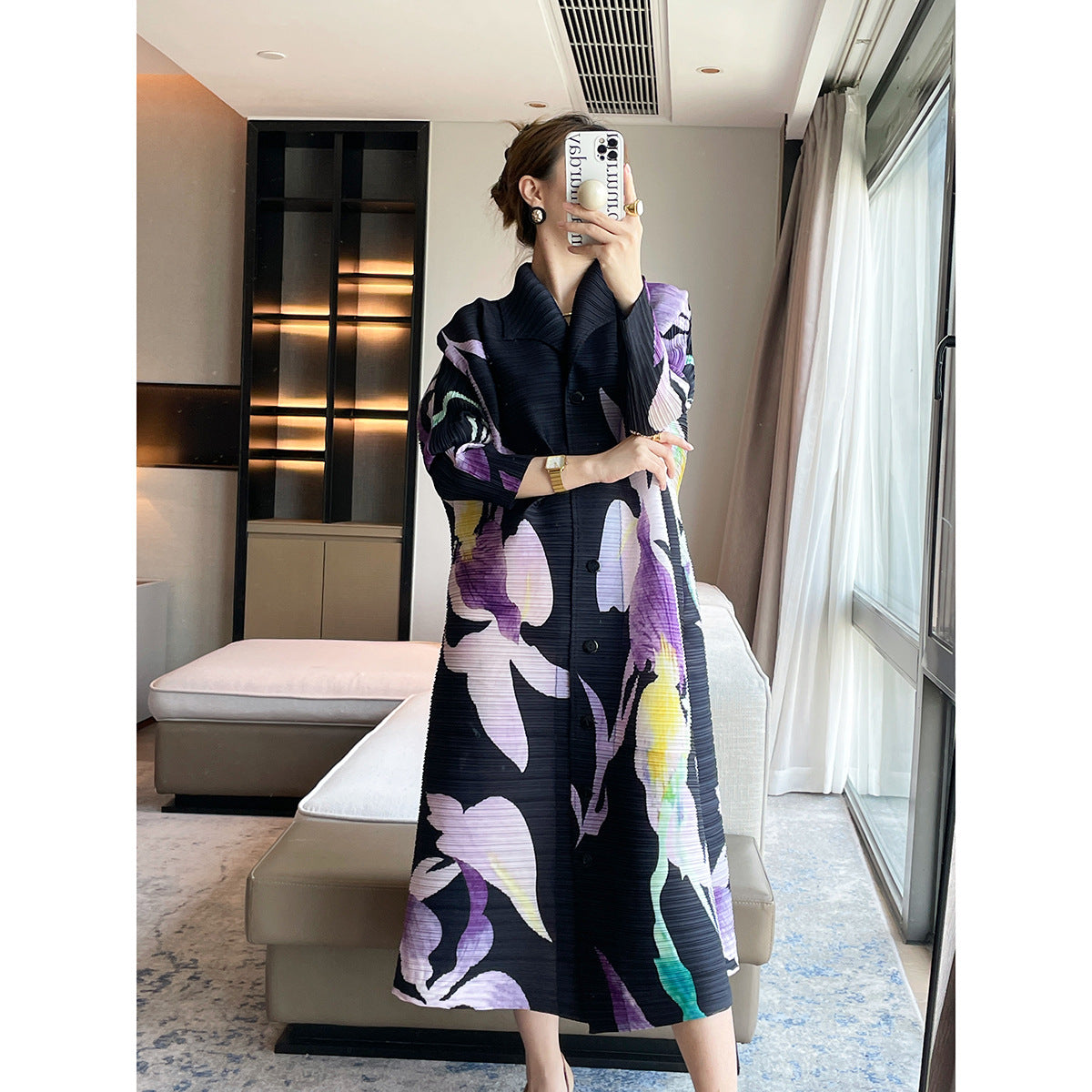 Pleated niche design sense, printing temperament, elegant lapel Miyake dress, loose cover meat and thin big swing skirt women