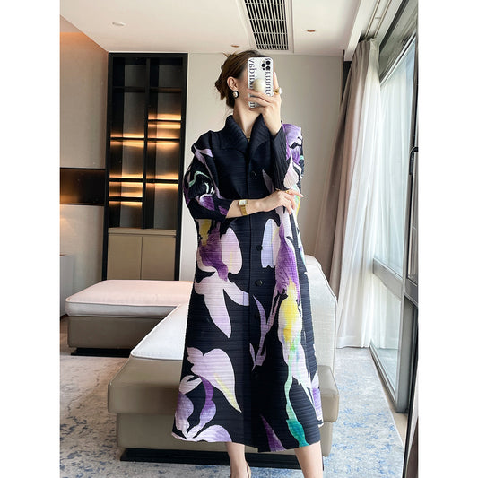 Pleated niche design sense, printing temperament, elegant lapel Miyake dress, loose cover meat and thin big swing skirt women