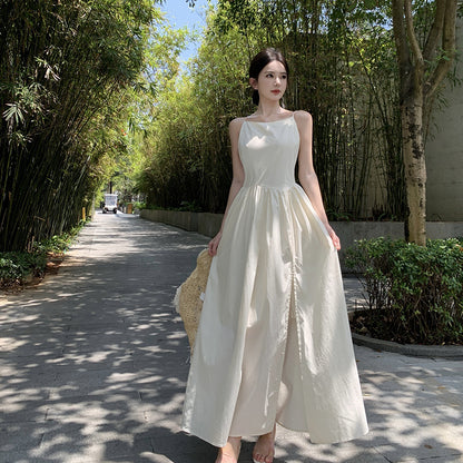 2025 Pure desire backless suspender dress female summer design sense Spice girl a word waist fairy seaside vacation long skirt