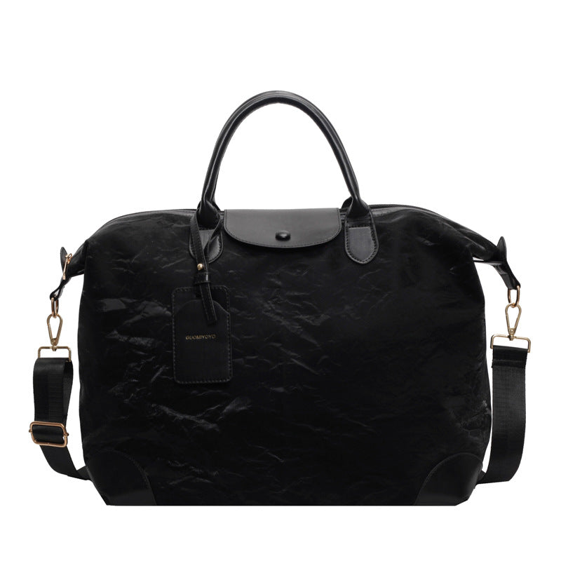 2025 New large-capacity portable travel bag, women's light sports fitness bag, outdoor leisure travel bag, duffel bag.