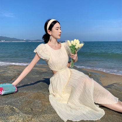 2025 Niche design sense hollow waist seaside vacation flying sleeve dress women's summer Sanya travel photo dress