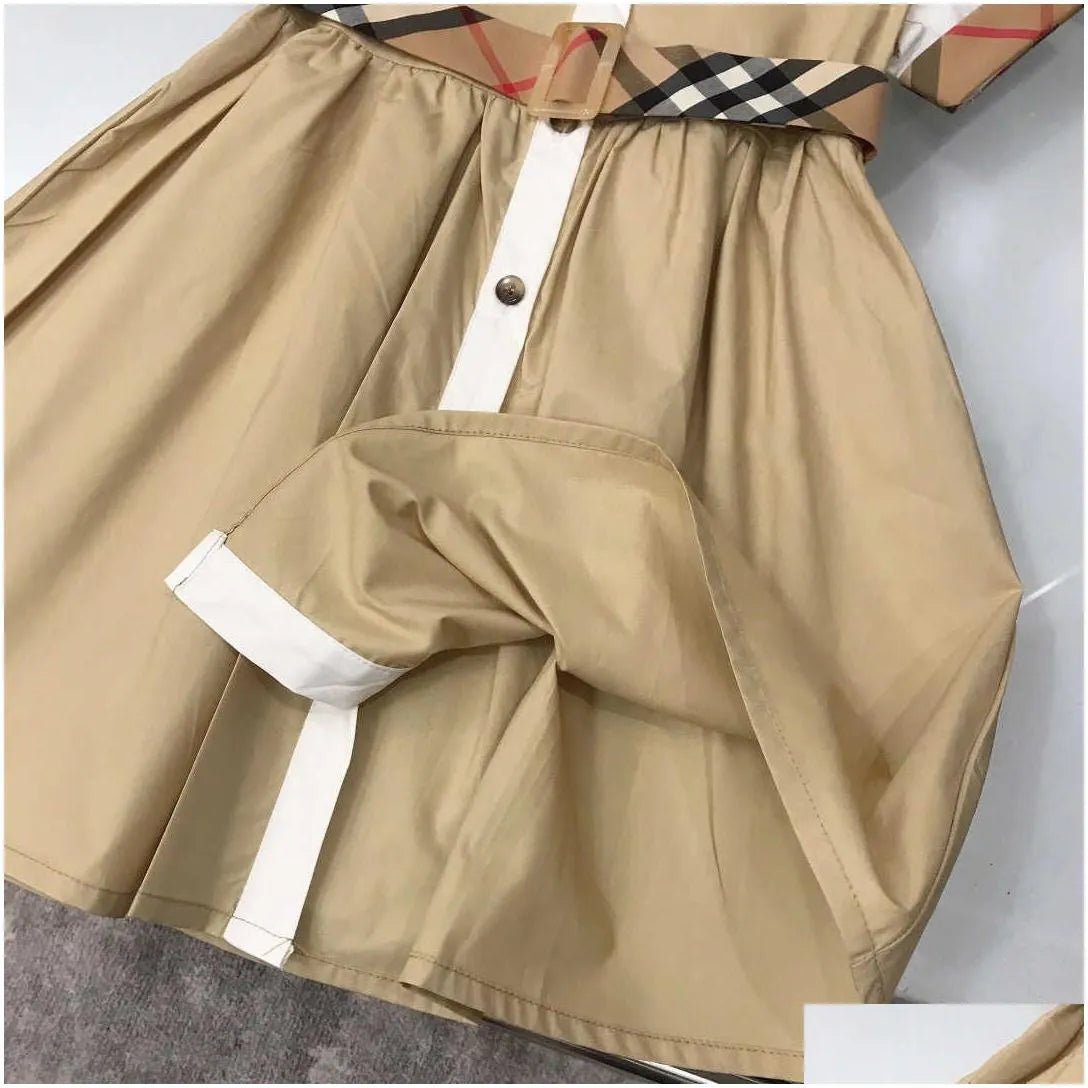 Girls Dresses 23Ss Princess Dress Short-Sleeved Kids Designer Clothes Lapel Lattice Splicing Belt Shirtdress Big Shirt Skirts Drop Del Dhnu8